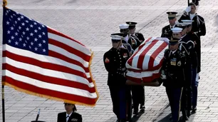 Fotos | Los estadounidenses olvidaron sus divisiones en el adiós a George Bush