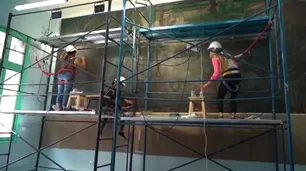 Restauran 15 murales de Quinquela Martín en una escuela del barrio de La Boca