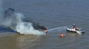 Se incendió un barco deportivo en el Río de la Plata y rescataron a tres tripulantes